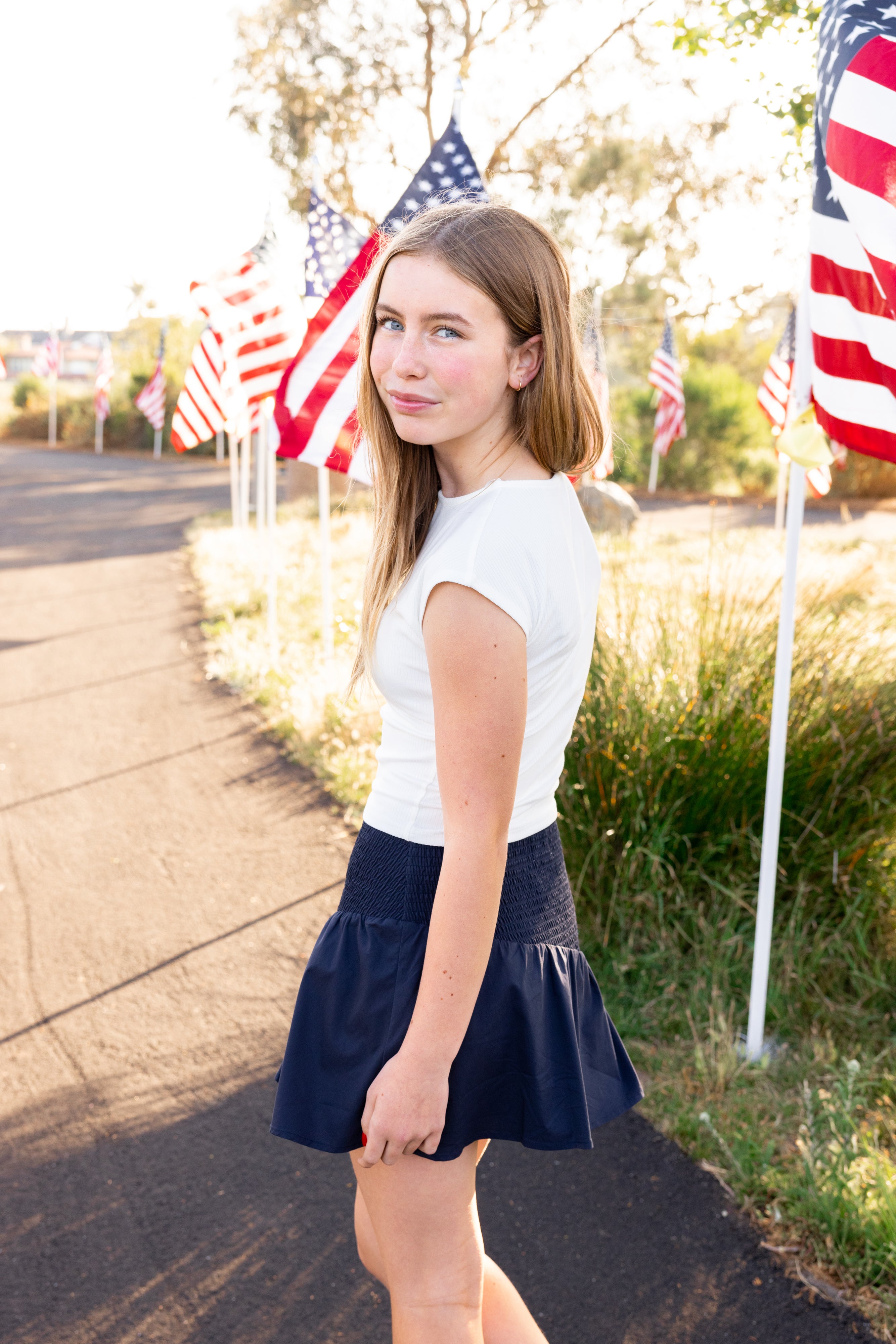 Fourth of July outfit inspo for tween and teens from leypop shoppe newport beach blue smocked mini skirt
