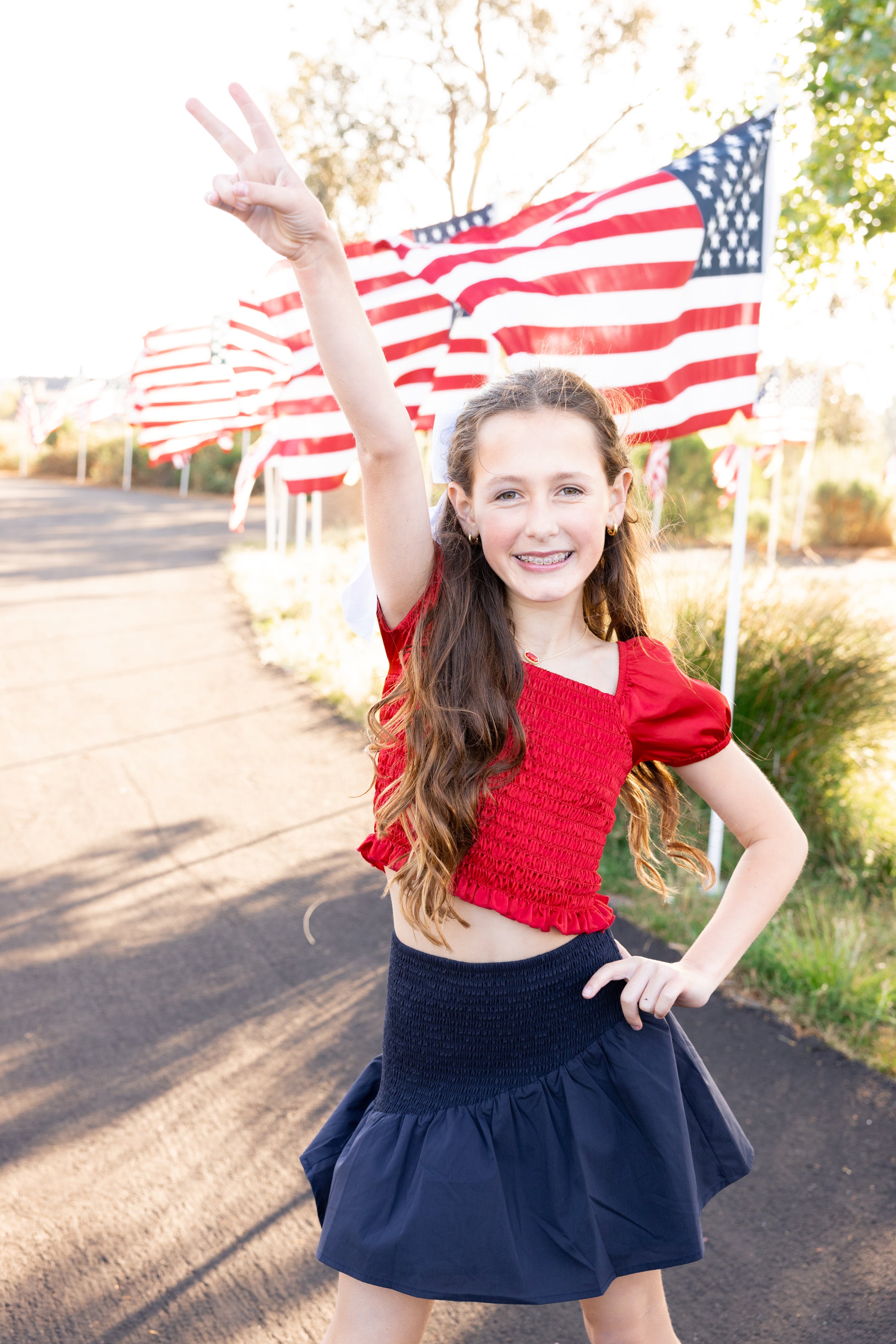 Fourth of July outfit inspo for tween and teens from leypop shoppe newport beach blue smocked mini skirt