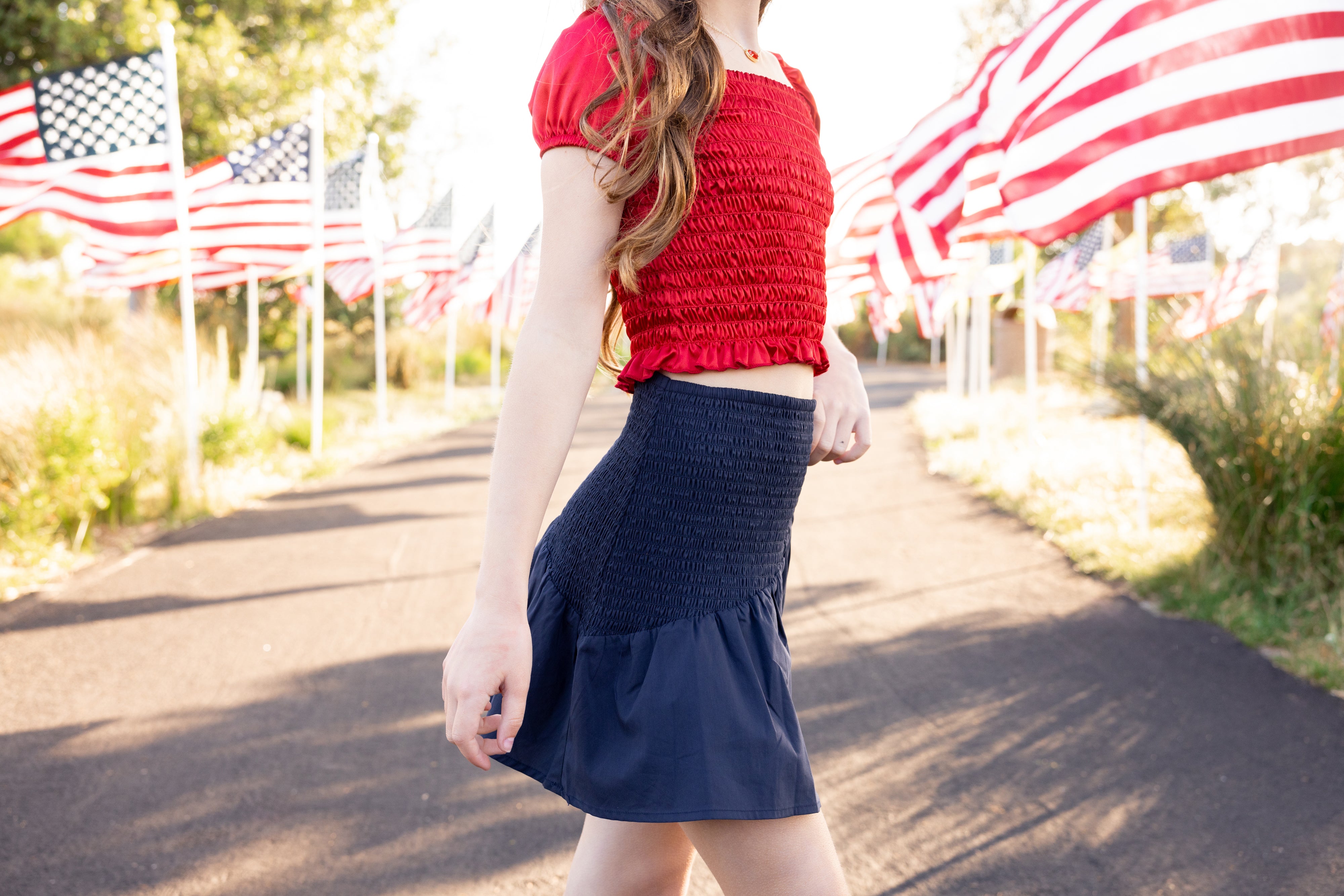 Fourth of July outfit inspo for tween and teens from leypop shoppe newport beach blue smocked mini skirt