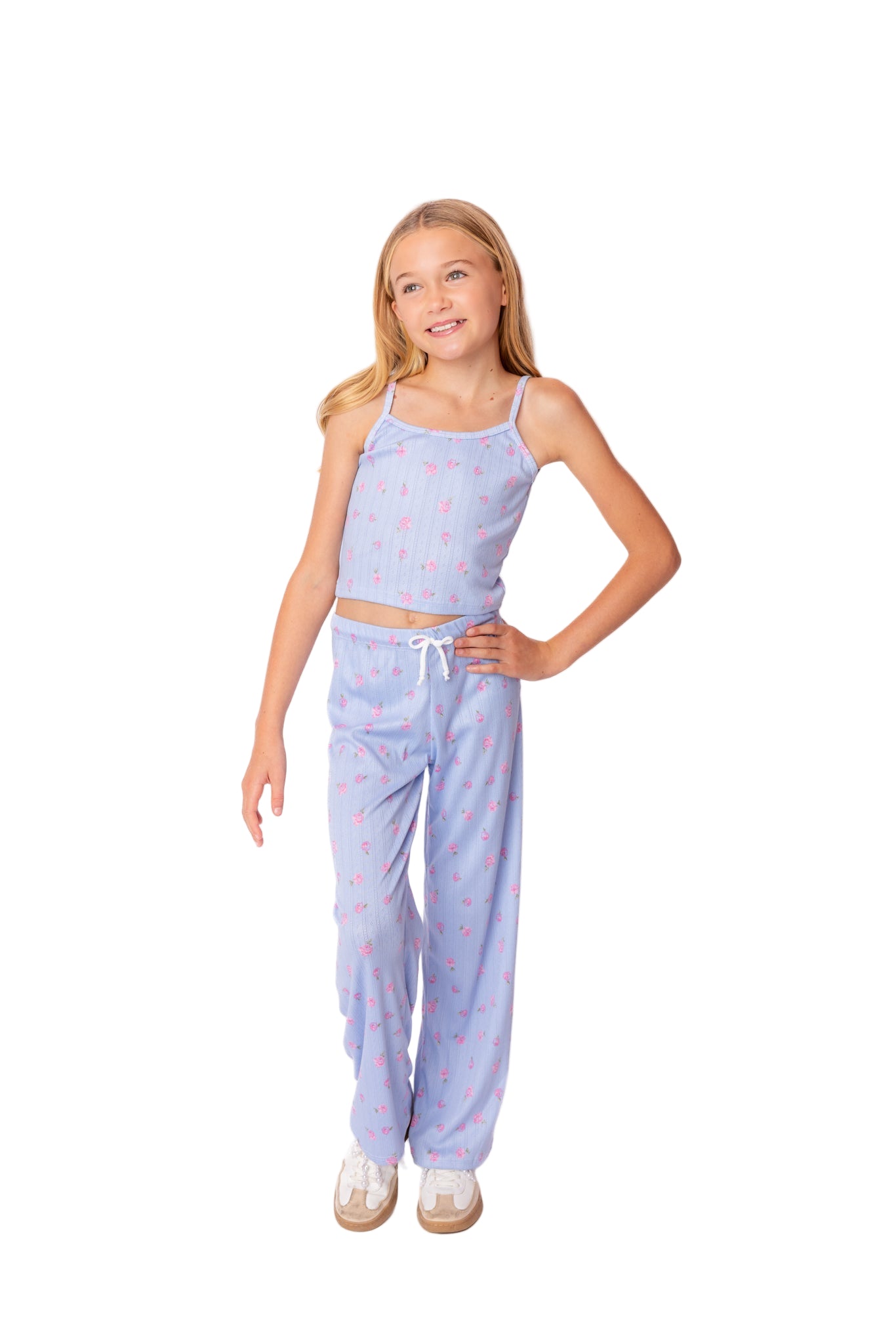Young girl wearing a light blue pajama set from viral must visit store newport beach ca tween, teens style and fashion.
