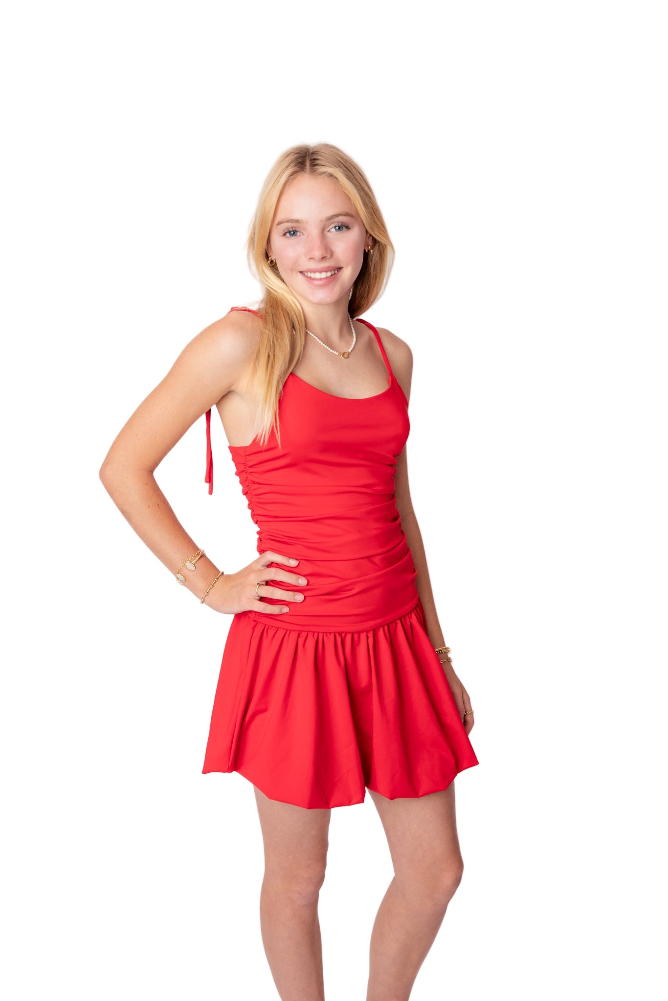 Woman wearing a red dress on a white background
