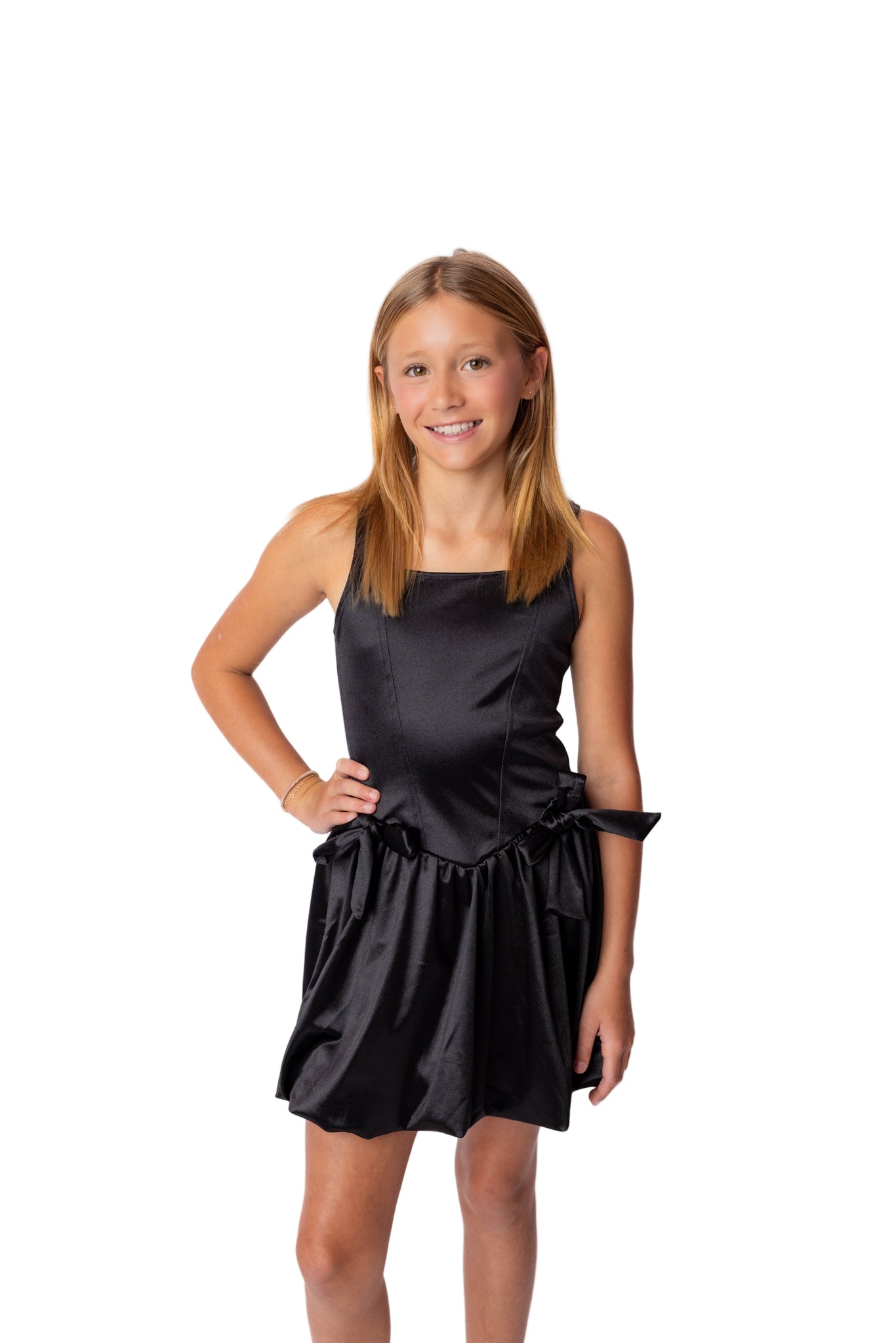 Young girl wearing a black dress on a white background